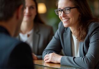 Two people in discussion