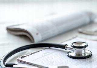 Newspaper and stethoscope
